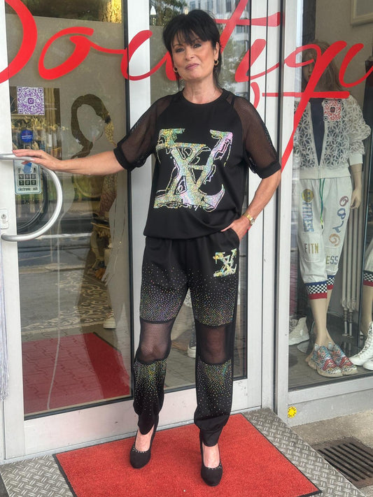 Glitzer Zweiteiler mit Netzdetails